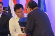 Prof Nishimura presented the five-volume ASEAN@50 publication to President Rodrigo Duterte of the Philippines